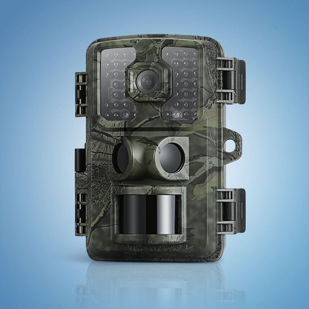 Camouflage-patterned wildlife camera on a blue background