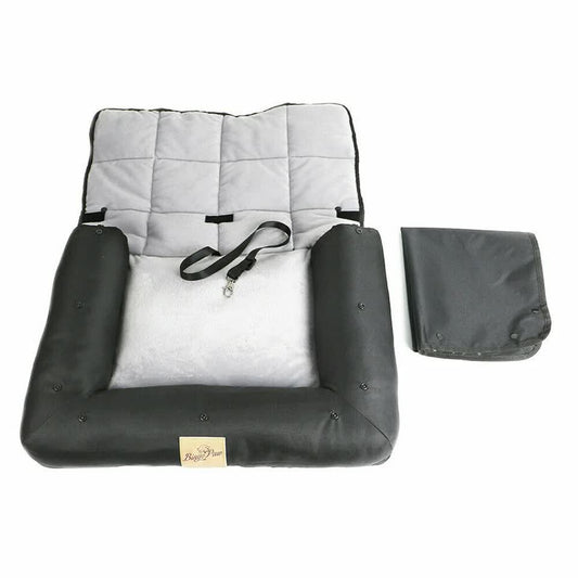 Pet bed with quilted cushion and carrying case on a white background