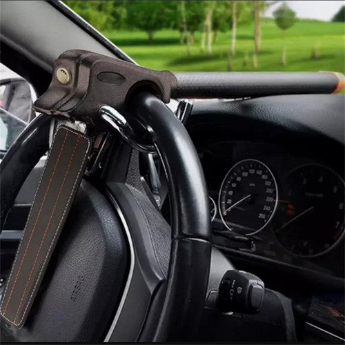 Steering wheel lock attached to a car steering wheel