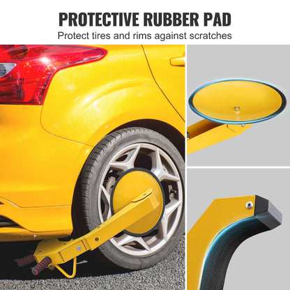 Yellow car wheel clamp with protective rubber pad on a gray background